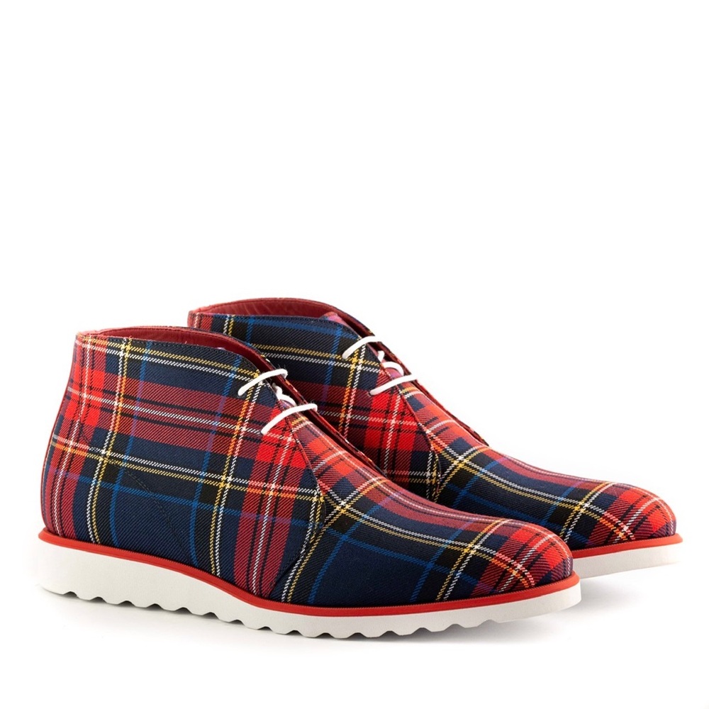 Hand made chukka boots by designer Que Shebley.